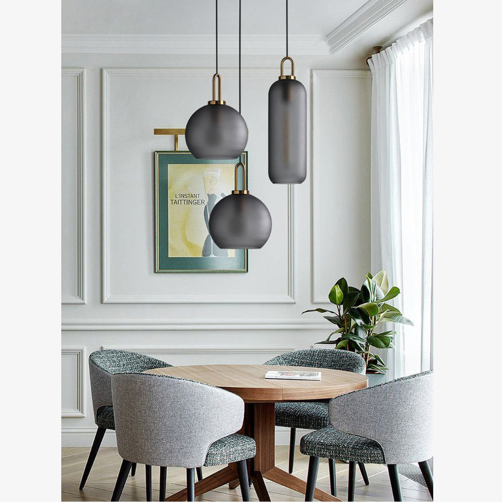 Globe and Capsule Glass Pendant Light with Brass Arch - Modern Style