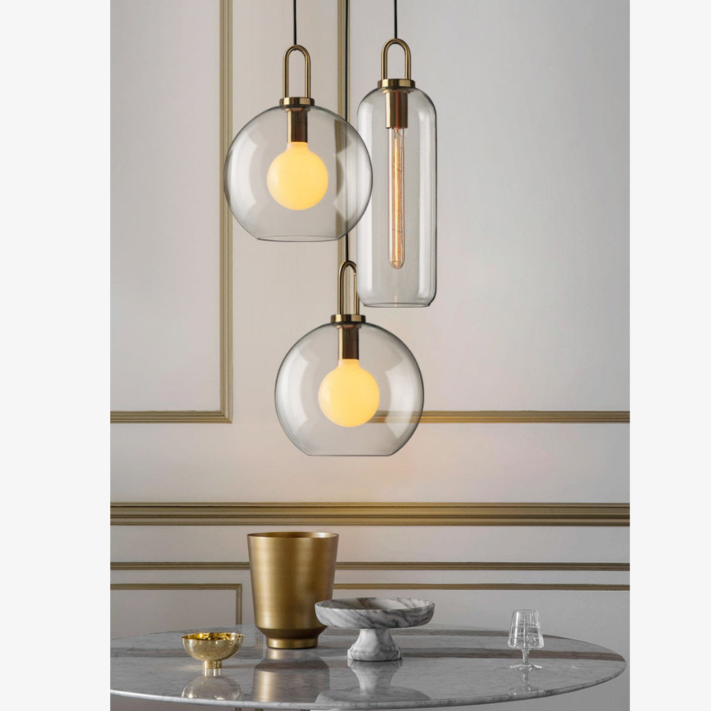 Globe and Capsule Glass Pendant Light with Brass Arch - Modern Style