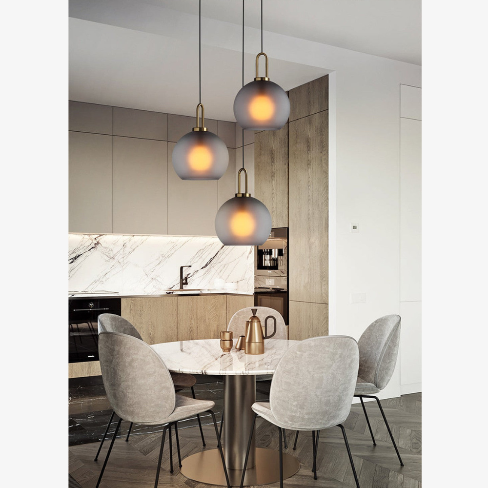 Globe and Capsule Glass Pendant Light with Brass Arch - Modern Style