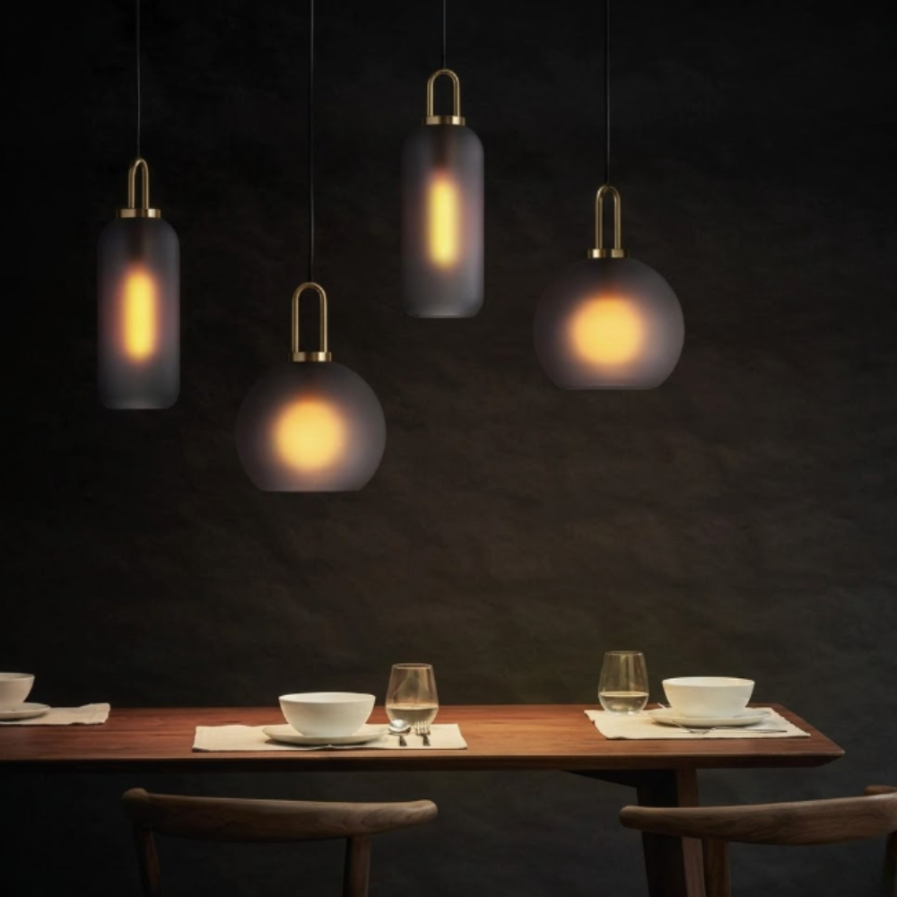 Globe and Capsule Glass Pendant Light with Brass Arch - Modern Style