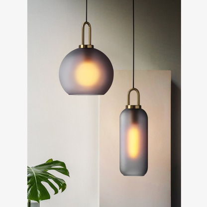Globe and Capsule Glass Pendant Light with Brass Arch - Modern Style