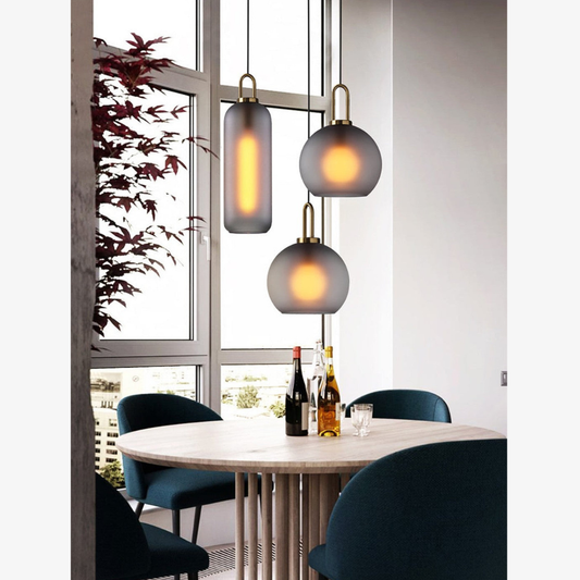 Globe and Capsule Glass Pendant Light with Brass Arch - Modern Style