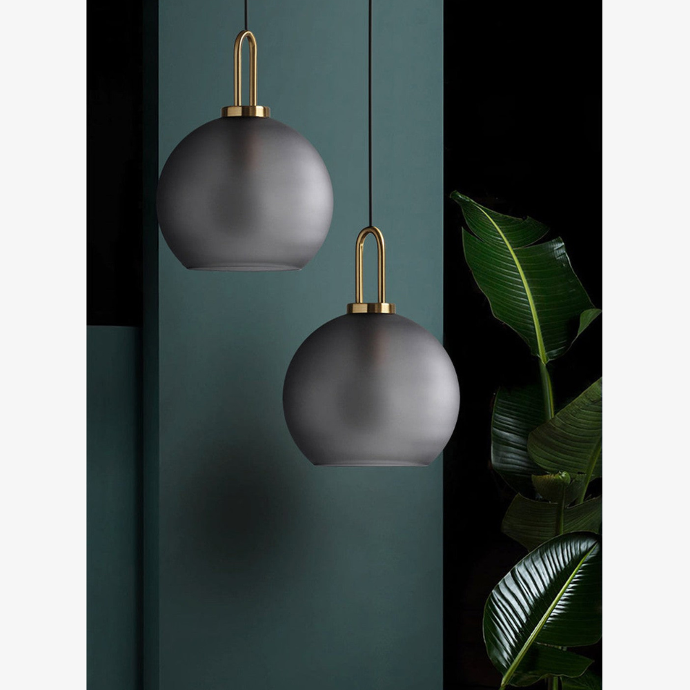 Globe and Capsule Glass Pendant Light with Brass Arch - Modern Style