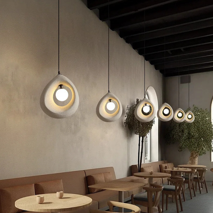 Hollow Stone-Style Hanging Lamp with Glowing Orb - Nordic Earthy Decor